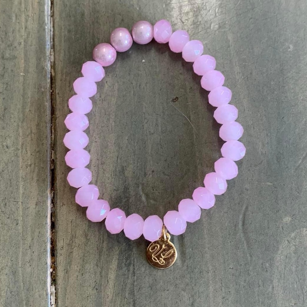 Victoria Lynn pale 10 MM pale pink/rose gold Glass Beads Stretch Bracelet.